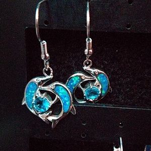 Blue opal and taurine dolphin earrings